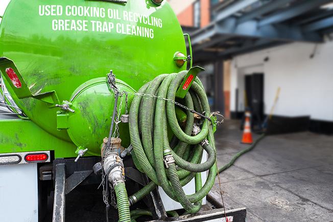 Grease Trap Cleaning of Bedford workers